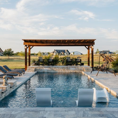 Stone Walkway Leading to Cozy Patio in Gunter TX